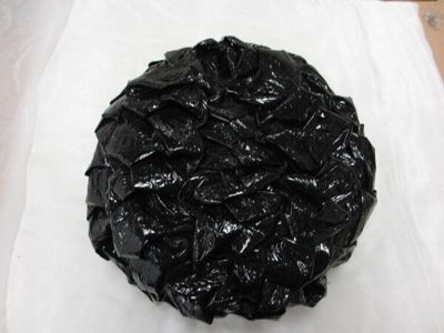Black cellophane hat, Harrods, Great Britain, 1960s.