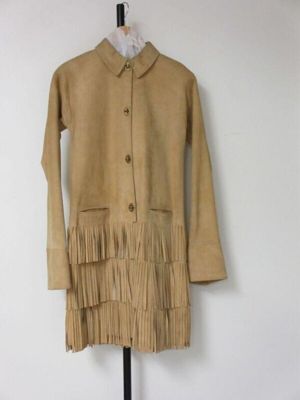 Suede shirt dress trimmed with fringed trim, designed by Bonnie Cashin, made by Sills & Co., United States, 1968
