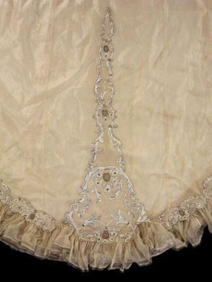 Wedding dress of satin and organza, designed by Sarah Fullerton Monteith Young, London, 1902