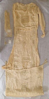 Wedding dress of embroidered silk satin and embroidered headdress, London, 1924