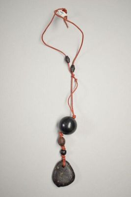 Necklace, red leather thong, natural and plastic beads, British, ca. 1970?