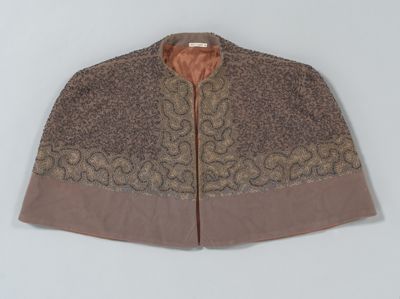 Gray beaded capelet with fur collar and trim