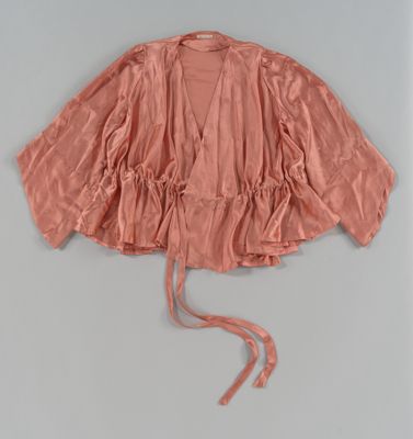 Pink satin blouse and full length skirt