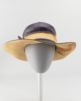 Navy and cream straw hat with cream buckle
