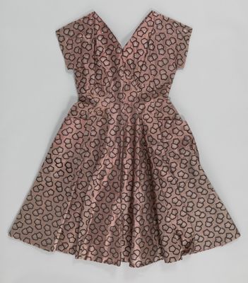 Mauve floral dress and belt with black capelet