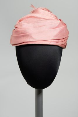 Pink draped turban with fringe