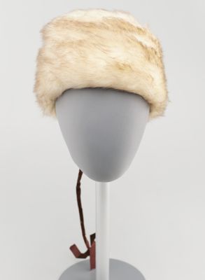 Grey and cream faux fur hat with brown ribbon