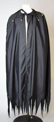 Cape, blue cotton and viscose trimmed with gold leather, coloured paste gems and bells, designed by Jane Kahn and Patty Bell, London, 1993