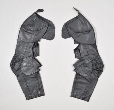 Man's leather waistcoat with armour-style sleeves, designed by Vivienne Westwood, England, 1980s.