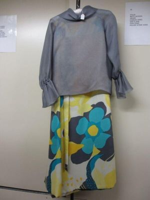 Grey silk organza blouse and printed linen skirt, matching shoes