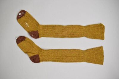 Pair of socks, yellow-and-brown Shetland wool, Cordings, part of fishing outfit, Great Britain, 1996.