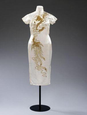Dress (<i>cheongsam</i> or <i>qipao</i>), white silk embroidered with a large coiled dragon in gold, Hong Kong, 1950s