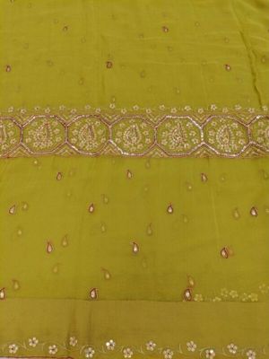 Sari, chartreuse coloured chiffon with silver and red embroidery and silver sequins. Embroidered in India or Pakistan, 1960s