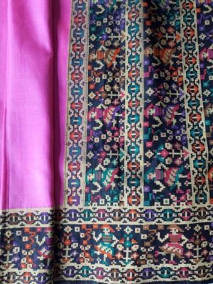 Bright pink silk sari, woven with figures in a cubed style similar to early computer designs, possibly made in China from articifical silk, 1970s