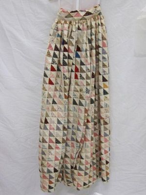 Evening ensemble consisting of cotton patchwork skirt and sash, cotton blouse and ruff and muslin petticoat, designed by Adolfo, United States, ensemble designed in 1967 and patchwork made in the 19th century.
