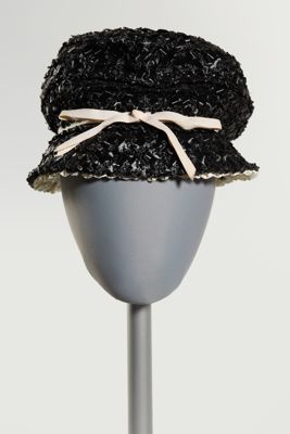 Black woven hat with white bow